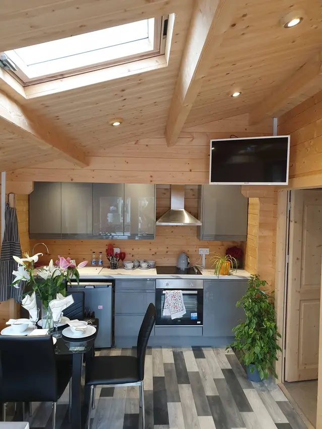 Cozy timber cabin tucked into an Irish garden