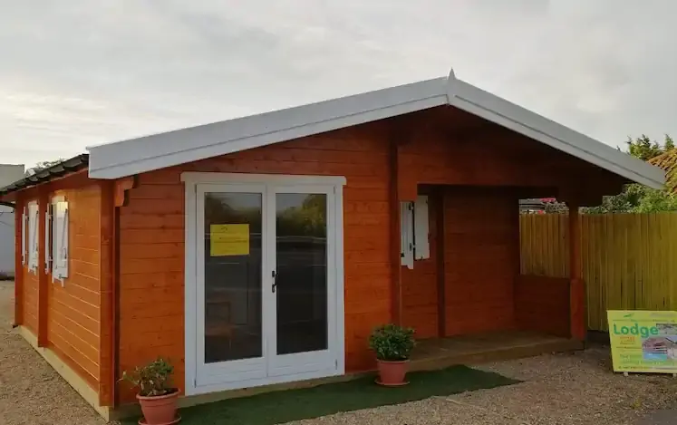 Timber outbuilding with wide entrance suitable for a garage