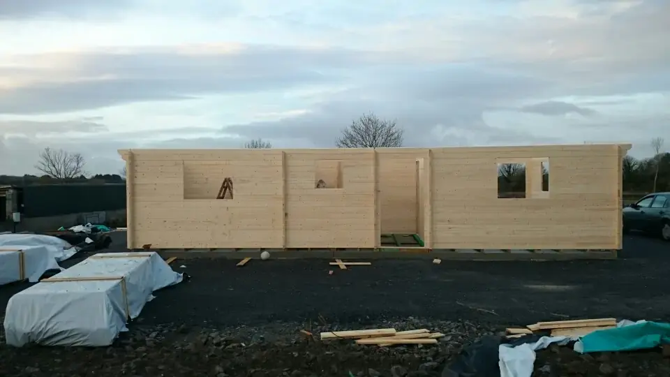 Timber cabin assembly during the winter months
